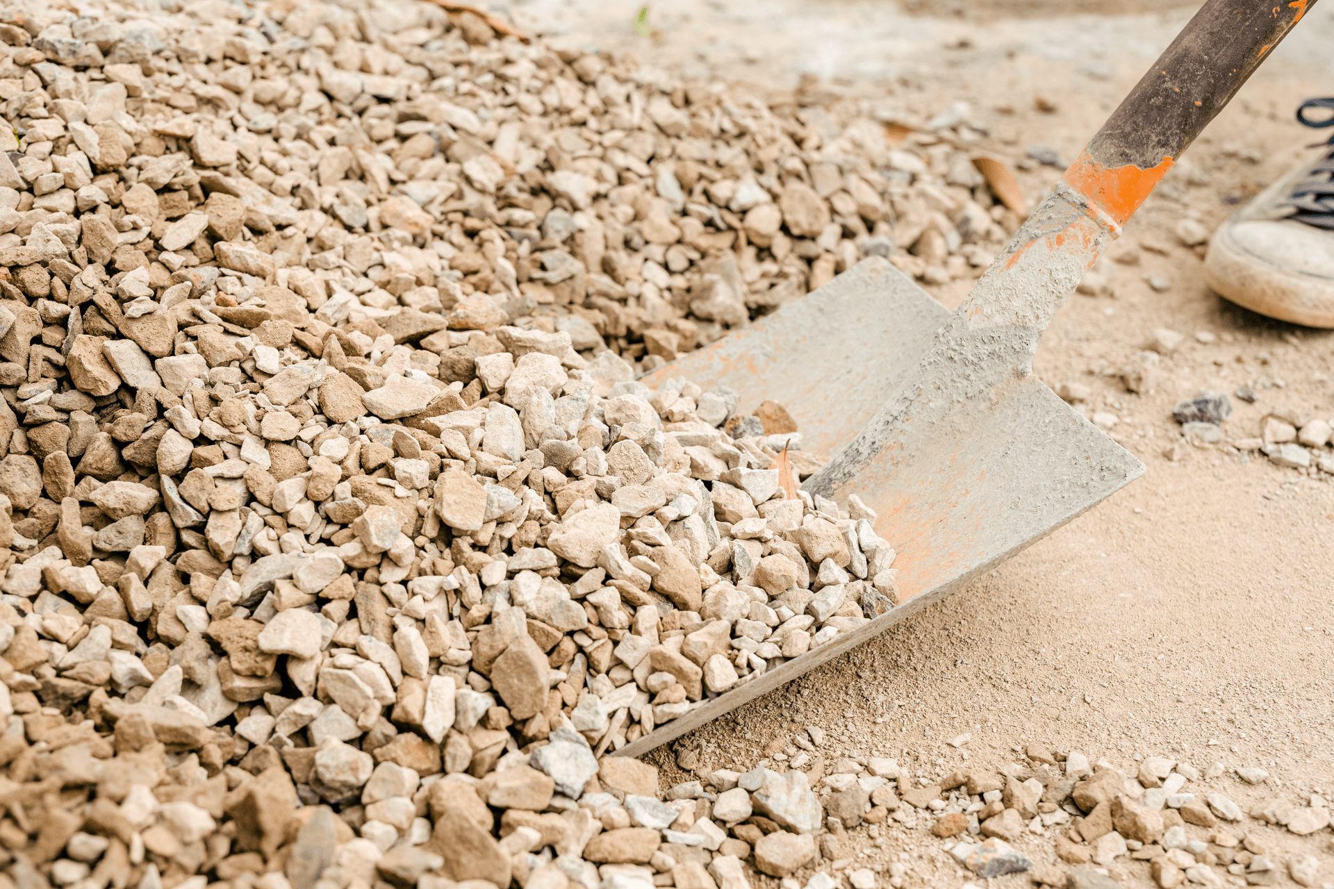 Construction technicians are mixing cement, stone, sand for construction.